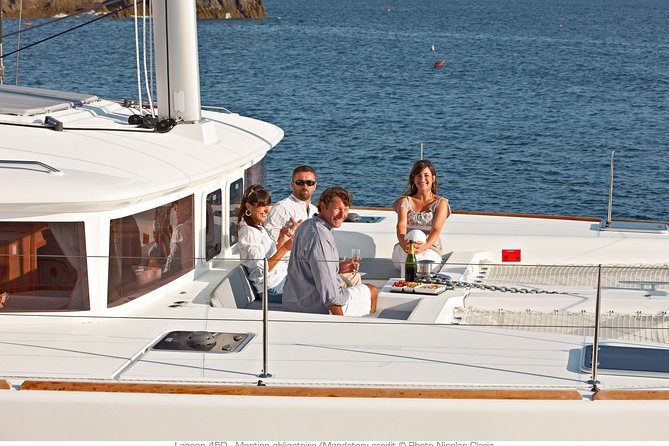 Santorini Small-Group Catamaran Sailing Trip(BBQ,drinks, transfer) - Red Beach Swim Stop: Red Sand, Warm Water, and Quick Snorkeling