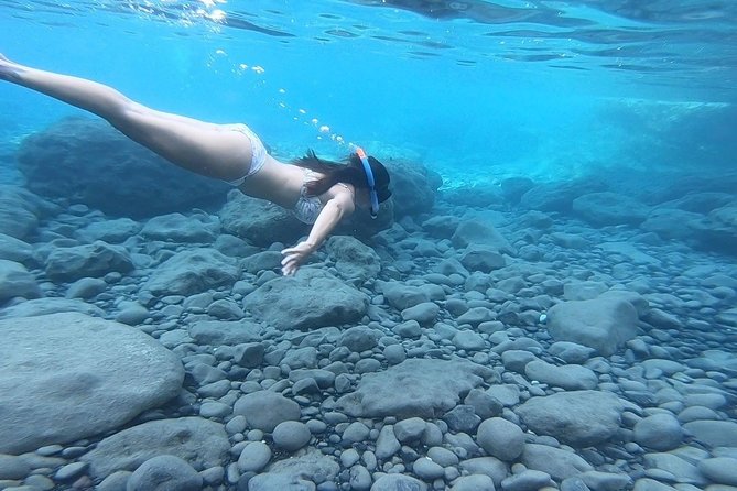 Santorini Stand-Up Paddle and Snorkel Adventure - Breakfast, Bottled Water, and the Small Break Perks