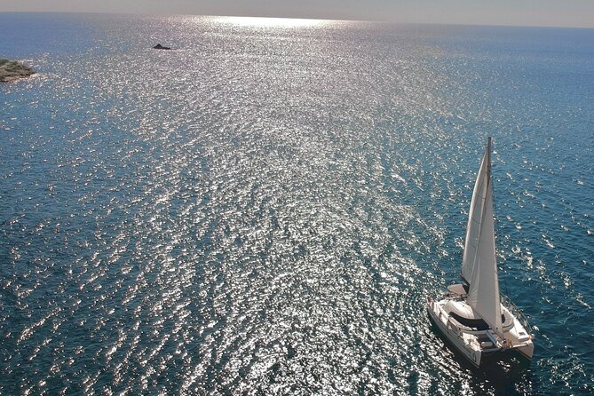 Santorini: Standard Small-Group Catamaran Cruise with Food/Drinks - Daytime vs Sunset Sailing: How Timing Changes the Cruise