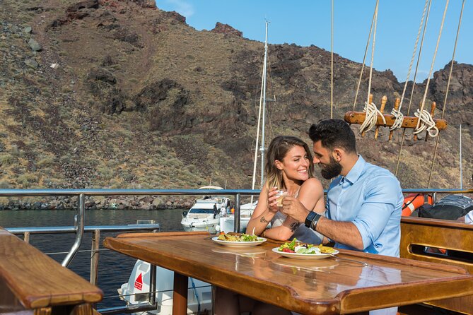 Santorini Sunset Dinner Cruise Including Nea Kameni Visit - Palea Kameni and the Two-Swim Setup