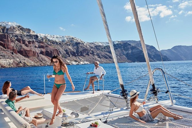 Santorini Sunset Luxury Sailing Catamaran Cruise with BBQ, drinks, transfer - Luxury Catamaran Cruising That Feels Relaxing, Not Formally Fancy