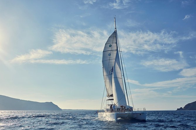Santorini Sunset Luxury Sailing Catamaran Cruise with BBQ, drinks, transfer - Sailing the Caldera: Palea Kameni and Volcano Views From the Sea