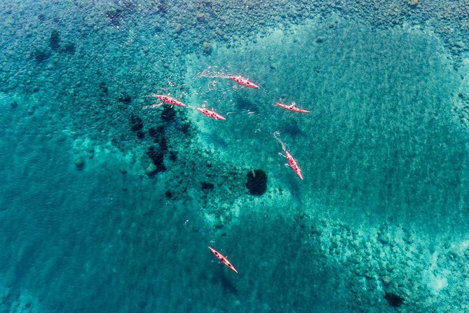 Santorini: Sunset Sea Kayak with Light Dinner with Pick-up Option - Mesa Pigadia Beach stop: a scenic breather with real views