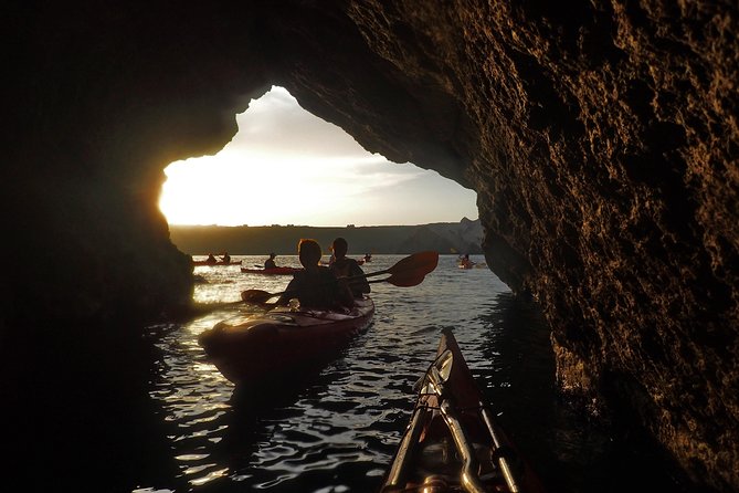 Santorini: Sunset Sea Kayak with Light Dinner with Pick-up Option - Snorkeling in the Aegean: what you get and how it feels