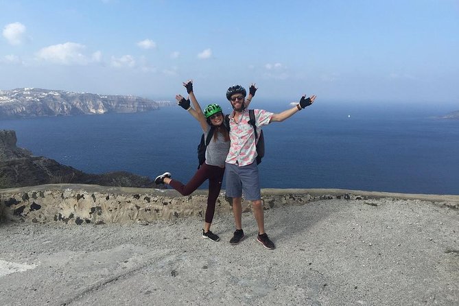 Santorini Tour on Electric Bikes & Scooters - Perissa Black Beach to the first backroad push