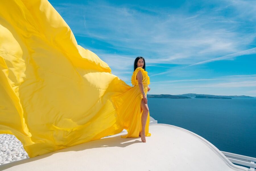 Santorini: Unique Flying Dress Photoshoot Experience - Why the Flying Dress Works So Well in Oia