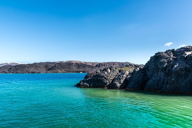 Santorini Volcano and Hot Springs Cruise Tour from Fira Old Port - Getting Ready: Shoes, Sunscreen, and Swim Stain Reality