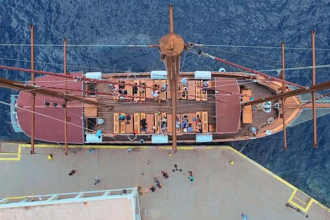 Santorini Volcano Sunset Cruise with Dinner - Dinner and Wine: Included Food, Included Wine During Dinner, and Seating Reality