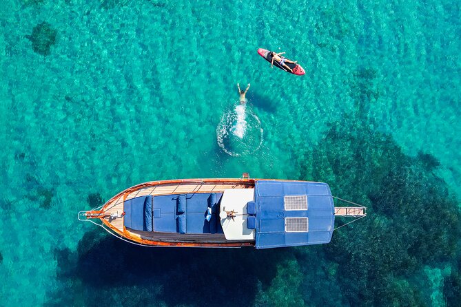 SemiPrivate Trip on 50ft Traditional Wooden Boat with Greek Lunch - Skopelos coves at Paralia Antrines, plus snorkeling and SUP
