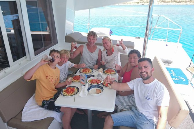 Shared Catamaran All inclusive-Day Cruise to Naxos or Paros - Crew and Group Size: Why Max 21 Works