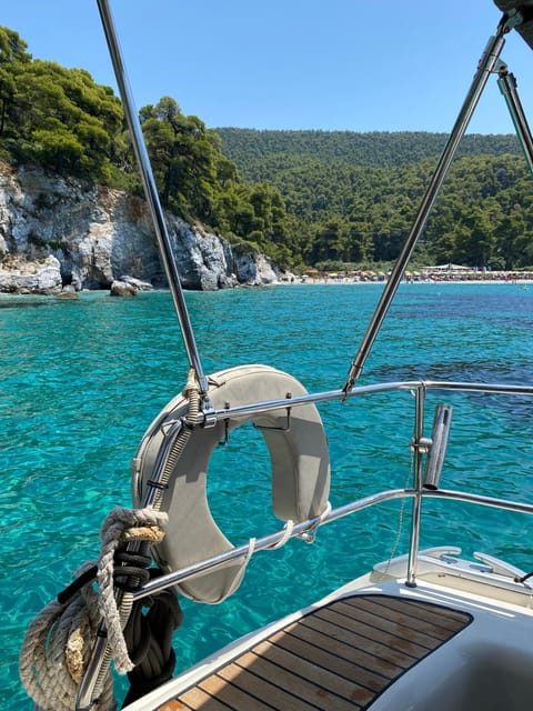 Skiathos: day sailing trip with swim stops and lunch - Sailing time, steering the boat, and that relaxed skipper energy