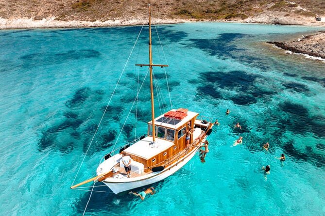 Small Group Kaiki Cruise & Greek Gastronomy Experience - Stop at Agios Nikolaos: The Chapel on a Small Island Swim Stop