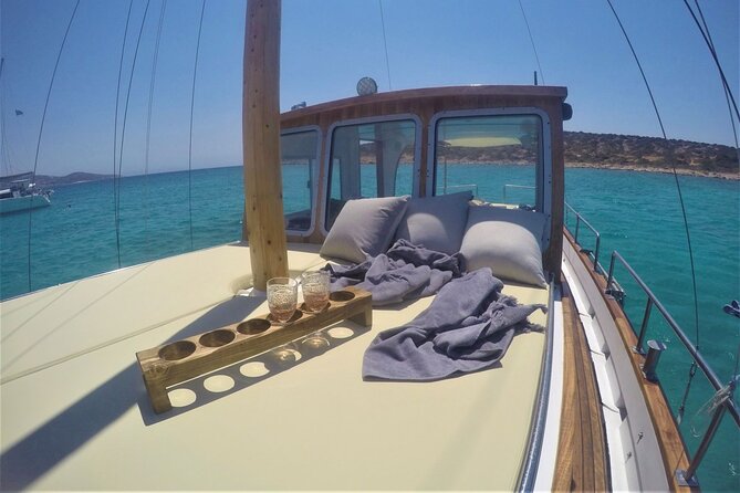 Small Group Kaiki Cruise & Greek Gastronomy Experience - Antiparos Coast: Rock Formations, Coves, and a Focused Water Break