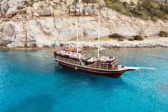 Sun & Sea 6 Hour All Inclusive Swimming Cruise with Greek BBQ & Unlimited Drinks - From Mandraki Marina to Three Swim Breaks in Six Hours