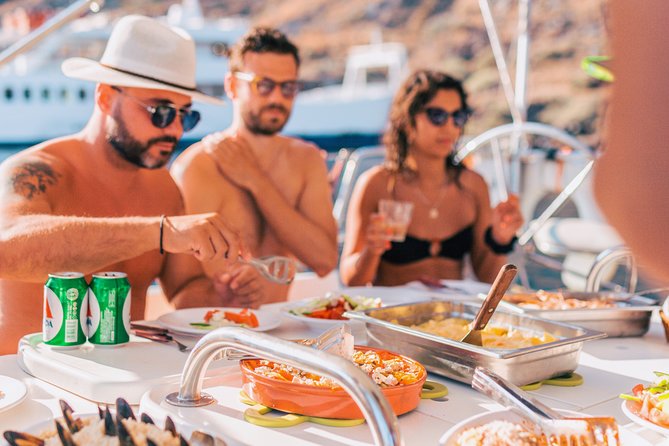 Sunset Caldera Sailing Cruise - Akrotiri Lighthouse: a classic landmark seen from the water