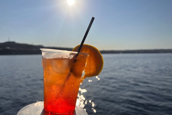 Sunset Cruise with Greek BBQ & Unlimited Aperol Spritz, Beer Wine - Watching the Sunset From a Sail: Music, Movement, and That Harbor Glow
