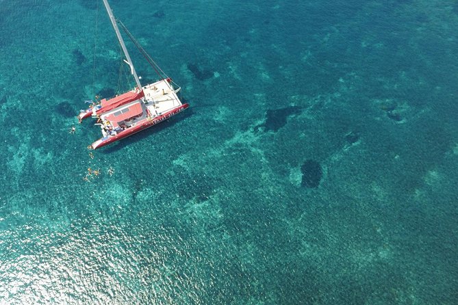 Sunset Sailing Catamaran Cruise in Santorini with BBQ and Drinks - Red Beach Snorkeling: Short Time, Clear Water Focus