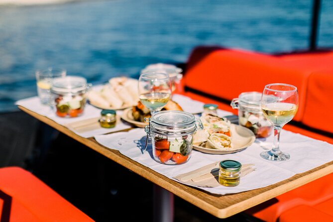 Three Greek Islands Full-Day Private Luxury Boat Tour - Kimolos coast at Karras: quick views of fishing villages and sirmata houses