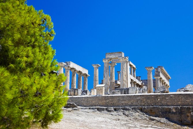 VIP Day Cruise from Athens to Hydra, Poros and Aegina - Poros First Stop: The Peaceful Town Walk and Clock Tower View