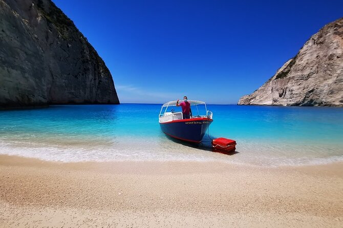 Zakynthos Early Morning Small Group Tour Shipwreck & Blue Caves - A Poseidon-face photo moment that mixes myth and math