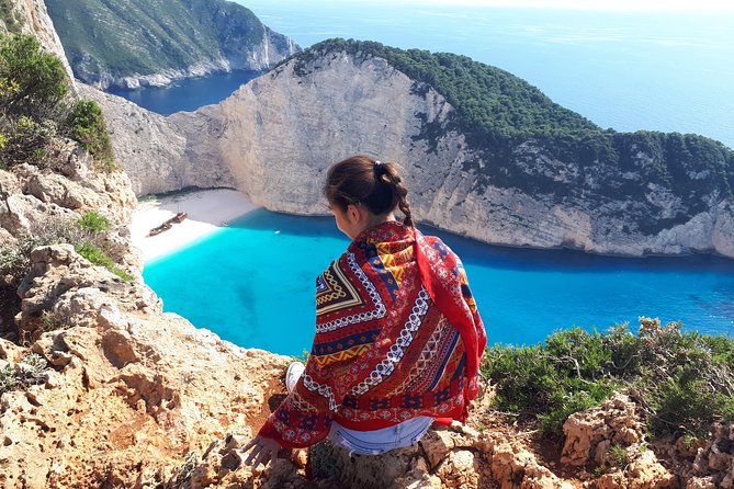 Zakynthos : One day small group tour to Navagio beach Blue Caves & top view - Blue Caves by boat, swim time, and the glass-bottom question