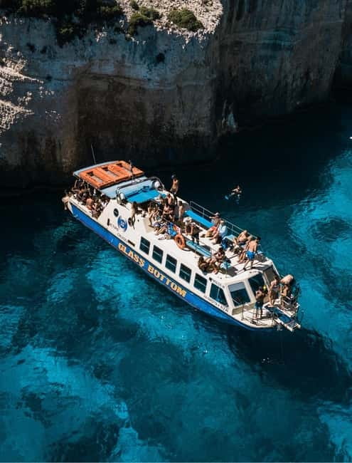 Zakynthos: Shipwreck, Blue Caves and Xigia Natural Spa Tour - Blue Caves swimming: what to expect from the 50 shades of blue