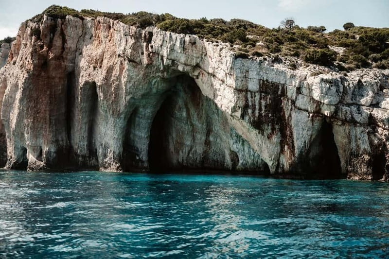 Zakynthos: Shipwreck, Blue Caves and Xigia Natural Spa Tour - Xigia Sulfur Beach natural spa: mineral water relaxation, plus a real break