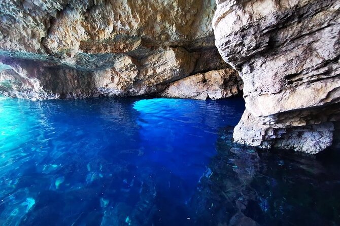 Zakynthos Small Group Tour Shipwreck and Blue Caves Land & Sea - Navagio Shipwreck Beach: Iconic Views, No Landing, and a Real Walk
