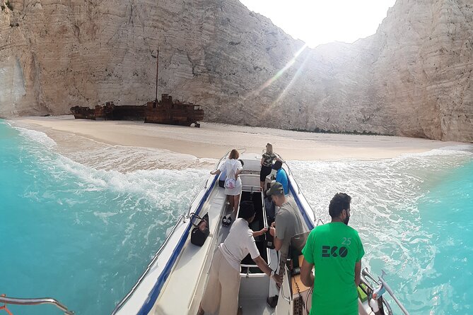 Zakynthos Small Group Tour Shipwreck bay Blue Caves by Land & Sea - Navagio viewpoint time: Shipwreck Beach photos with a shoes check