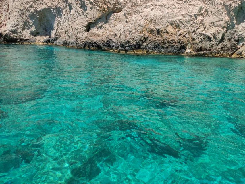 Zakynthos: Turtle Island and Caves Private Boat Trip - Agios Sostis Harbor: the private-boat vibe starts fast