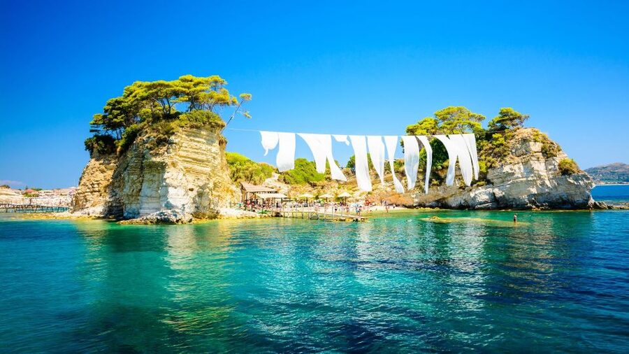 Zakynthos: Turtle Island and Caves Private Boat Trip - Marathonisi Island: Turtle Island shape and a swim break with style